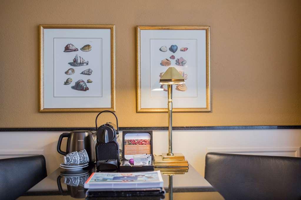 Grand Hotel Huis Ter Duin Noordwijk Zimmer foto A Nespresso machine in a hotel room